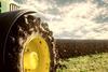 Agriculture.,Tractor,Plowing,Field.,Wheels,Covered,In,Mud,,Field,In  523560184