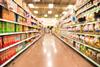 Blurred,Image,Of,Snacks,And,Canned,Chips,Aisle,In,Store