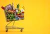 Shopping,Cart,Full,Of,Food,On,Yellow,Background.,Grocery,And