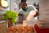 View,From,Fridge,Of,Afro-americal,Young,Man,Looking,Inside,Refrigerator