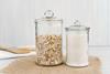 Two,Pantry,Jars,With,Oats,And,White,Sugar,,Glass,Jars
