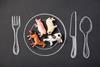 Toy,Pink,Pig,,Cow,,Horse,And,Sheep,On,A,Plate