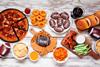 Superbowl,Or,Football,Theme,Food,Table,Scene.,Pizza,,Hamburgers,,Wings,