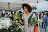Beautiful,Woman,Buying,Kale,At,A,Farmers,Market