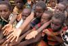Dadaab,,Somalia-august,15:,Unidentified,Children,Stretch,Out,Their,Hands,At