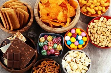 Salty,Snacks.,Pretzels,,Chips,,Crackers,In,Wooden,Bowls.,Unhealthy,Products.