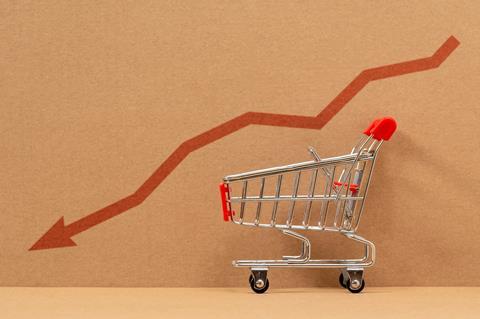 Empty,Grocery,Cart,With,The,Indicator,Of,A,Falling,Economy.