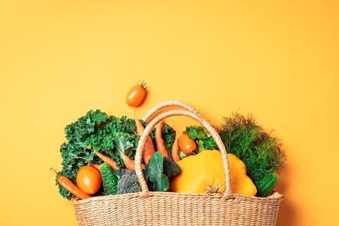 Straw,Basket,With,Organic,Vegetables,Over,Trendy,Yellow,Background.,Healthy