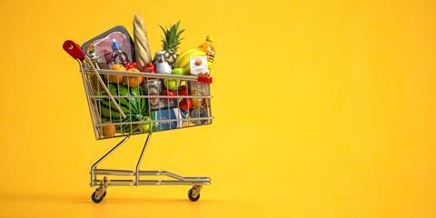 Shopping,Cart,Full,Of,Food,On,Yellow,Background.,Grocery,And