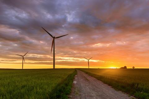 Windmills,For,Electric,Power,Production,At,Sunset,Time.,Poland,,Europe