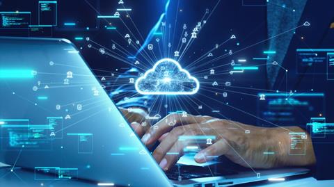 Close-up,Of,Hands,Typing,On,A,Laptop,With,A,Glowing