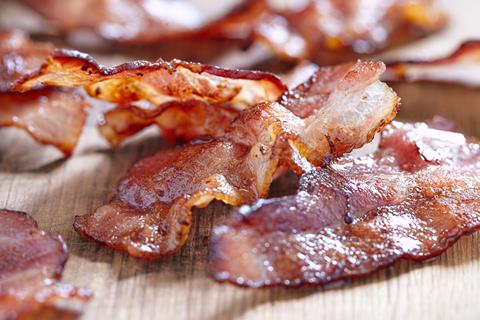 Crispy,Cooked,Bacon,On,Wooden,Table,,Close,Up