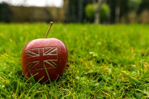 An,Apple,With,A,British,Union,Jack,Flag,On,In