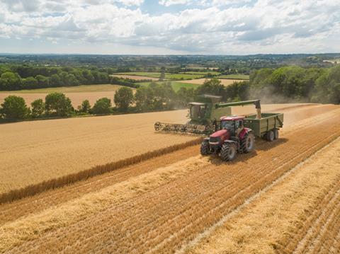 Harvest,View,Of,Combine,Harvester,Cutting,Summer,Oats,Field,Crop