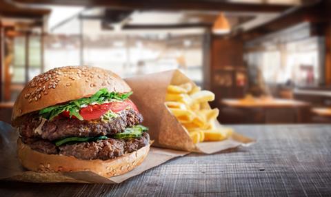 Delicious,Burger,On,The,Background,Of,The,Interior,Of,The