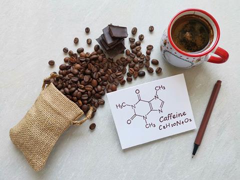 Chemical,Formula,Of,Caffeine.,Overturned,Rustic,Bag,With,Spilled,Coffee