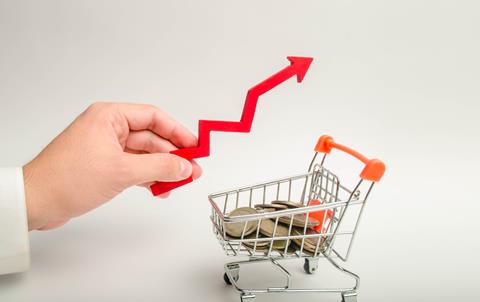 Hand,Of,A,Businessman,With,A,Red,Arrow,Pointing,Up