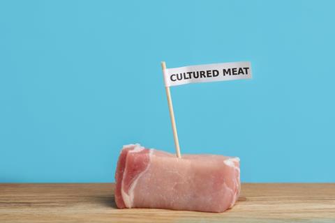 Sample,Of,Lab,Grown,Pork,Labeled,Cultured,Meat,On,Wooden