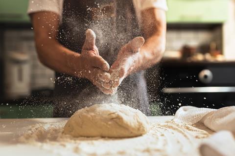Chef's,Hands,Spraying,Flour,Over,The,Dough.,Kneading,Dough.,Male