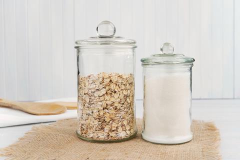Two,Pantry,Jars,With,Oats,And,White,Sugar,,Glass,Jars