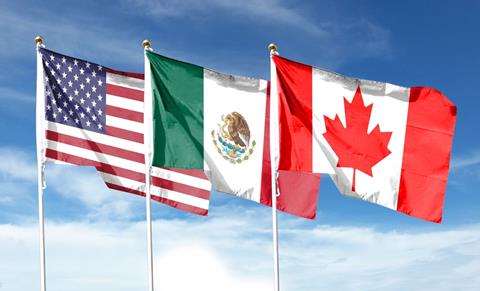 Flags,Of,Usa,And,Canada,And,Mexico,Against,Cloudy,Sky.