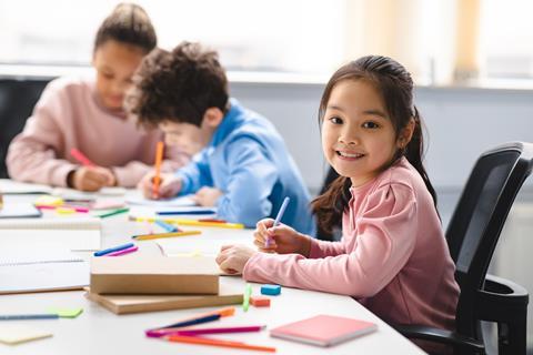 Academic,Concept.,Smiling,Junior,Asian,School,Girl,Sitting,At,Desk