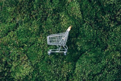 Shopping,Cart,On,Green,Grass,,Moss,Background.,Top,View.,Minimalism