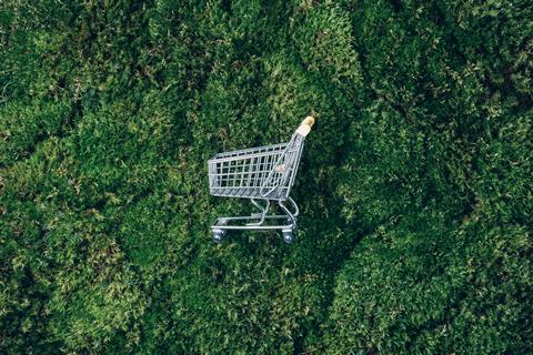 Shopping,Cart,On,Green,Grass,,Moss,Background.,Top,View.,Minimalism