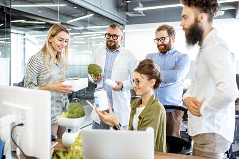 Group,Of,Diverse,People,Working,On,A,New,Eco,Product