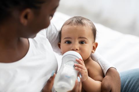 Cute,Little,African,American,Baby,Drinking,From,Baby,Bottle
