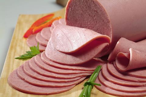 Sliced,Bologna,Decorated,With,Vegetables