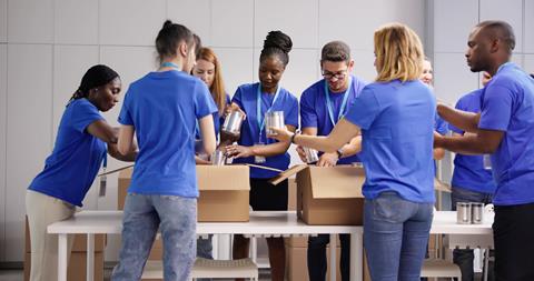 Food,Bank,Humanitarian,Aid,In,Donation,Boxes.,Volunteer,Community