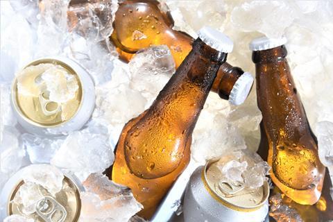 Beer,Bottle,And,Can,Chilled,In,Ice