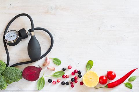 Heart-shaped,Blood,Pressure,Monitor,And,Vegetables,With,Fruits,To,Prevent